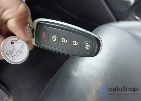 2016 Ford Escape Titanium z USA, uszkodzony, nr VIN 1FMCU0JX6GUB79270